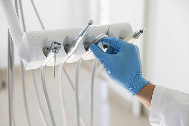 Professional Tooth Extraction technician working in Tazewell County County, VA